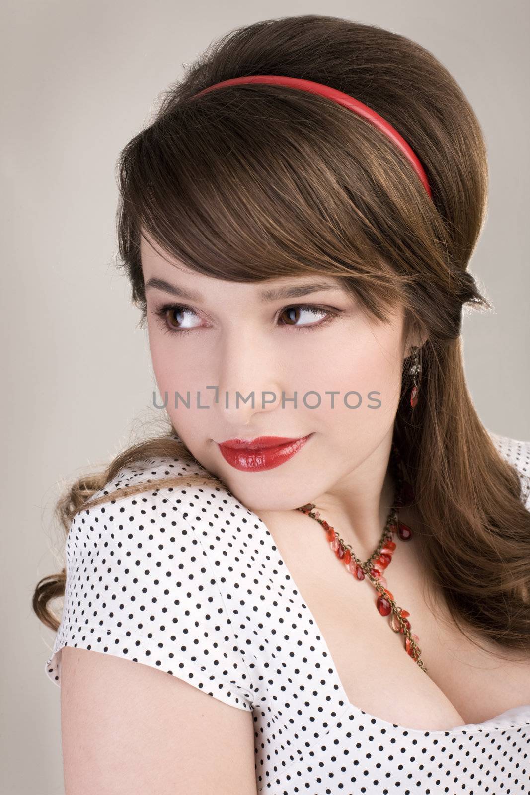 Portrait of a pin-up girl in retro style