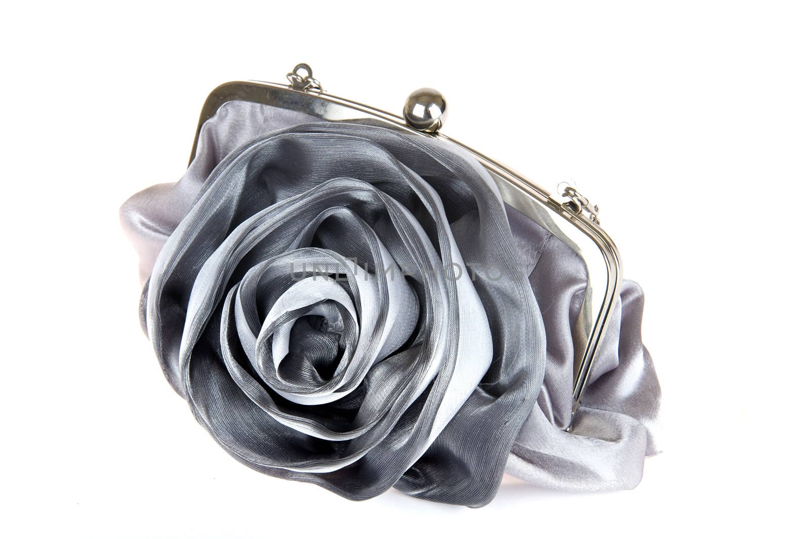 a silver handbag on a white background