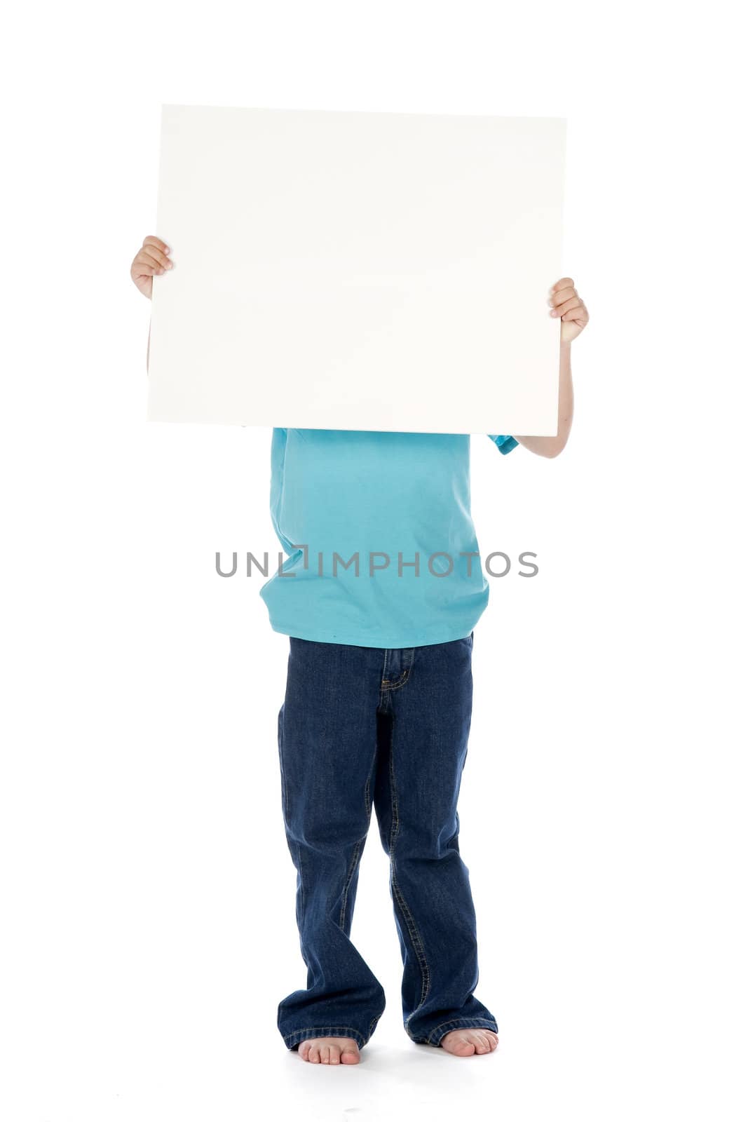 a little boy with a sign