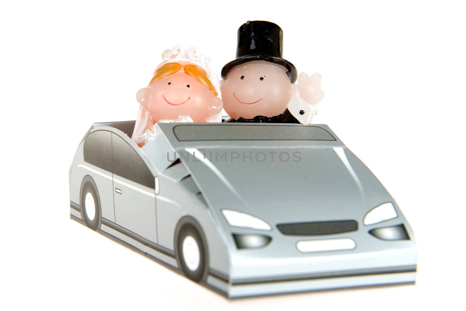 a very happy bride and groom in a weddingcar