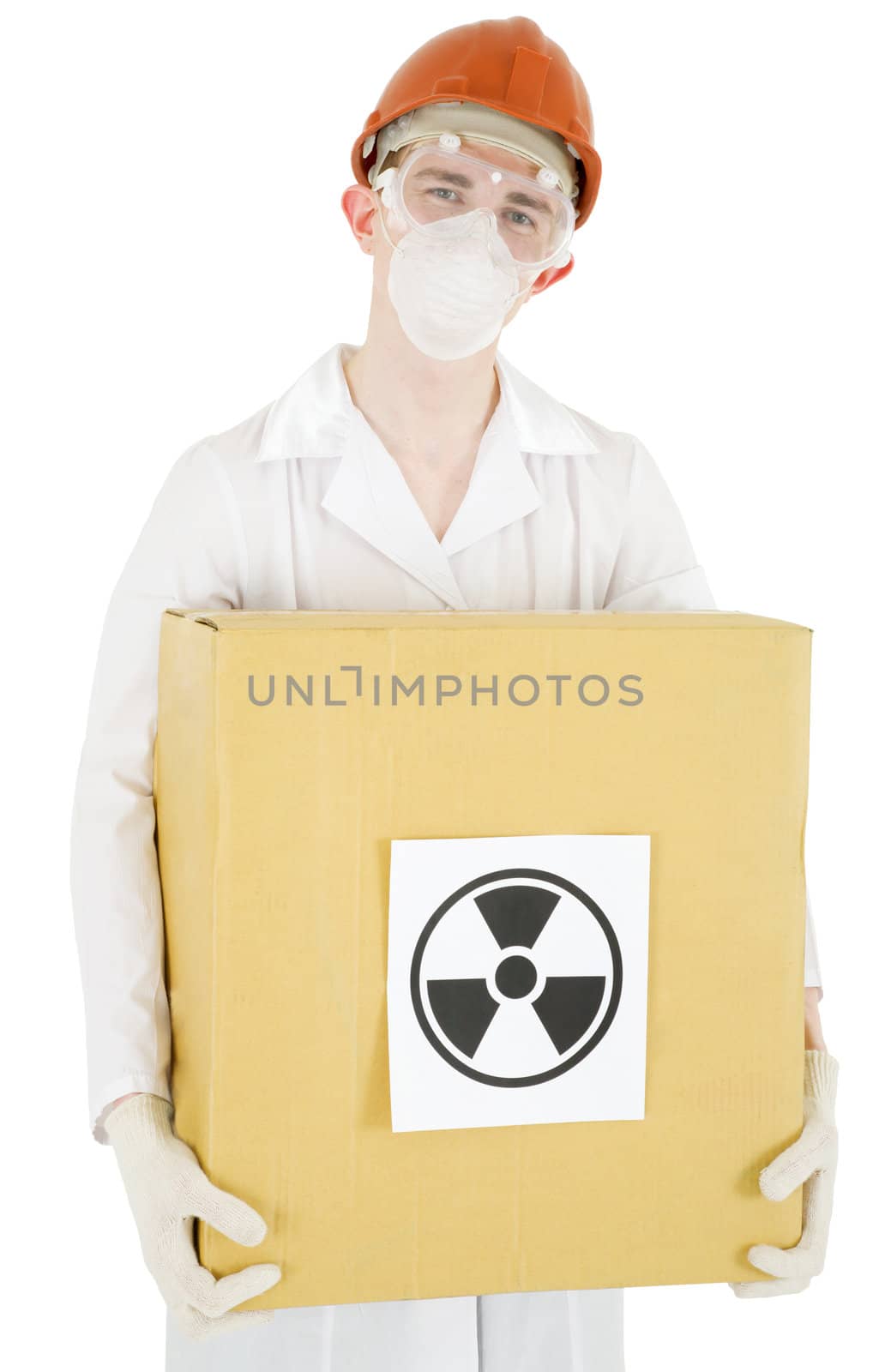 Man in garb scientist keeps cardboard box with sticker of the sign to radiation