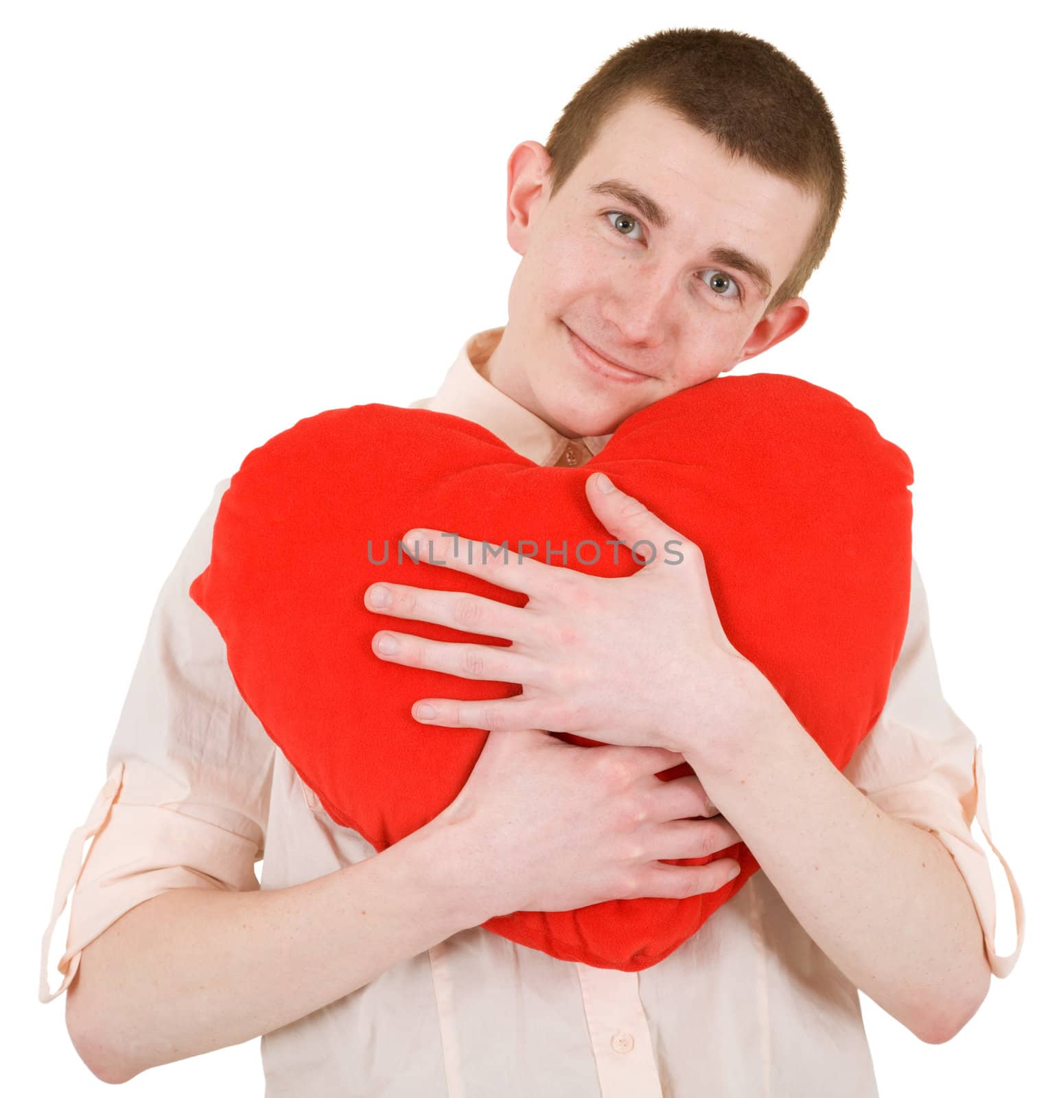 The young man holding over huge red heart