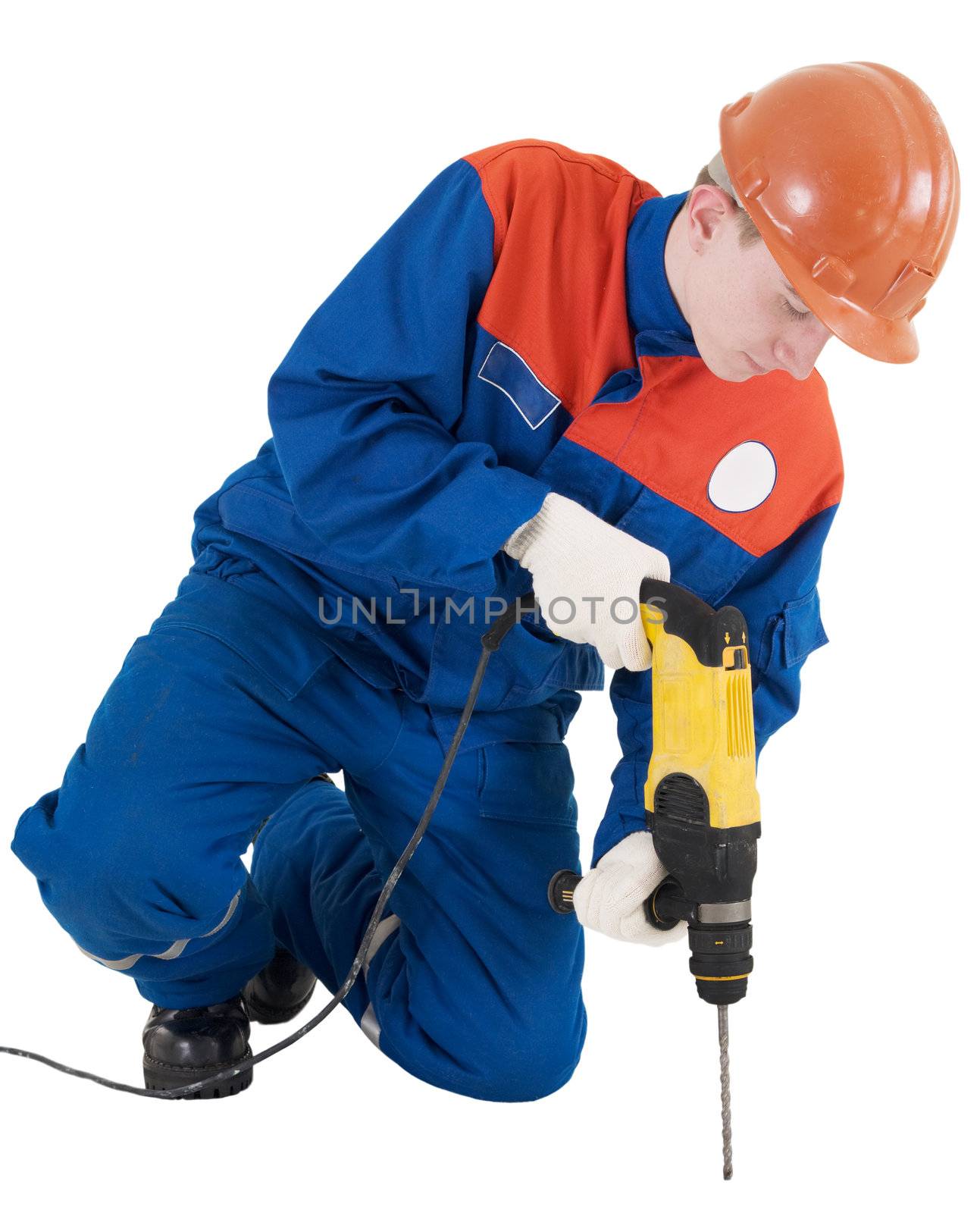 Labourer on the helmet with hand yellow drill