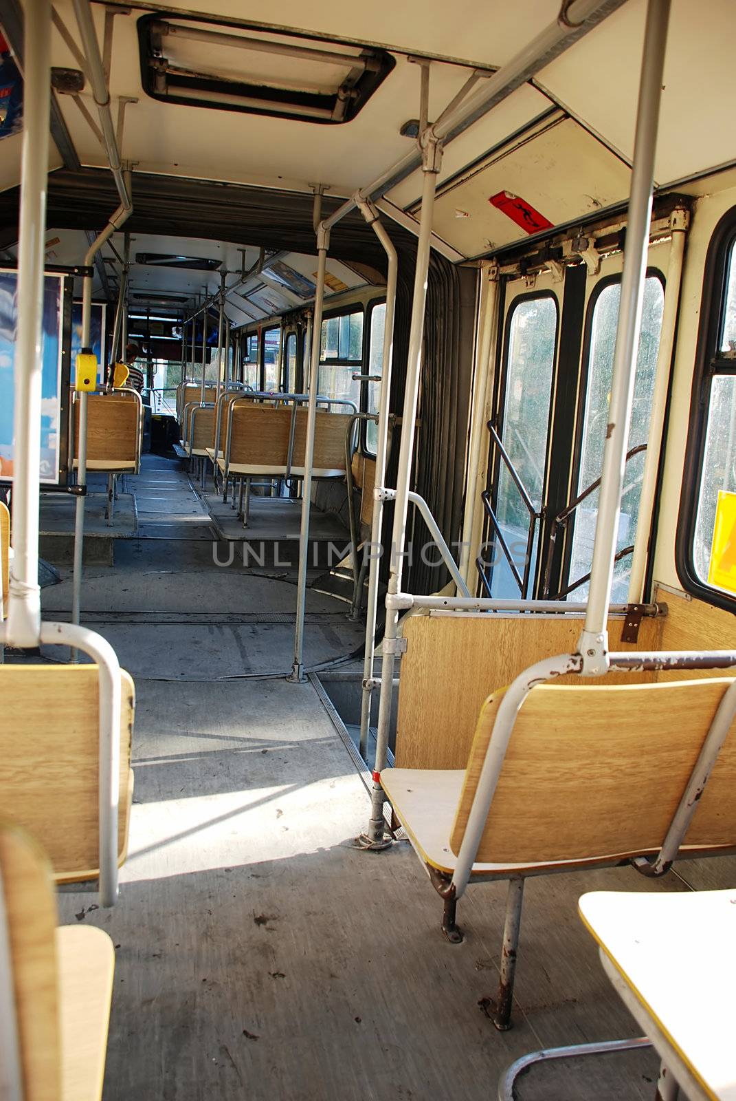 old empty city public bus interior wooden seats