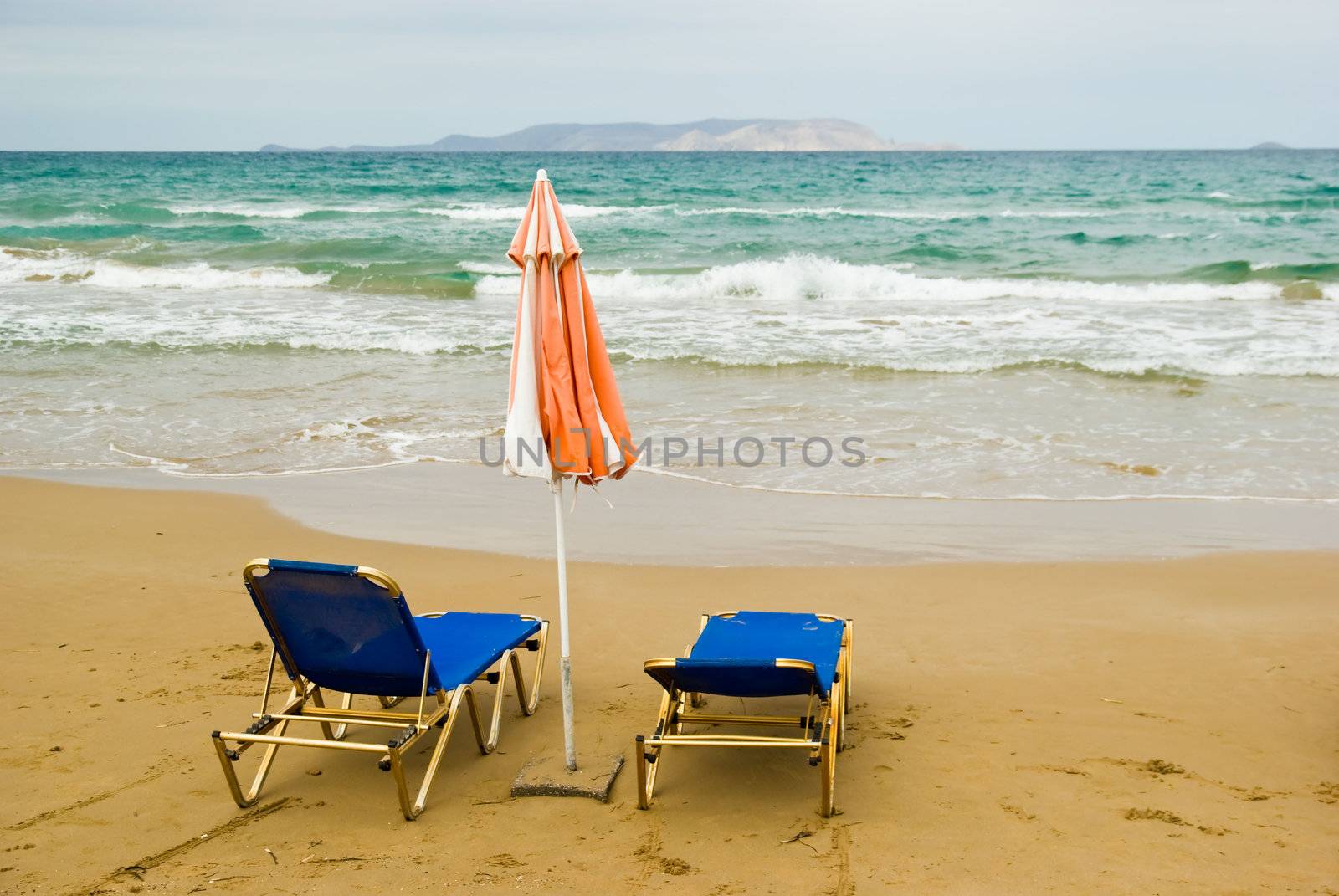 Chairs and umbrella on beach