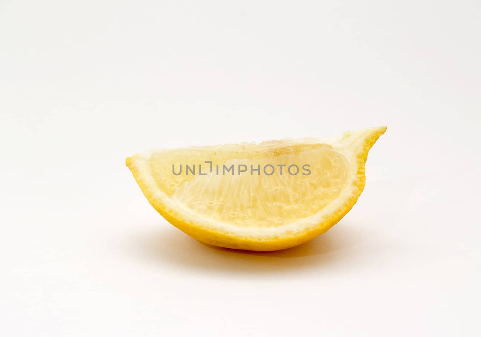 lemon cut on white bottom
