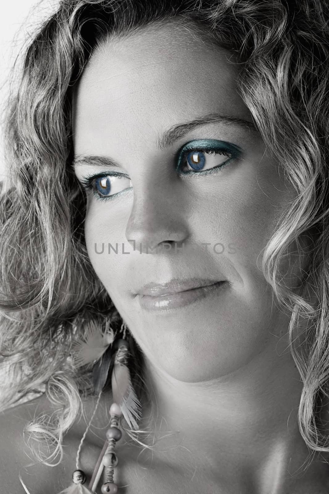 Close-up portrait of beautiful blond woman portrait - Black and  White image with colored eyes