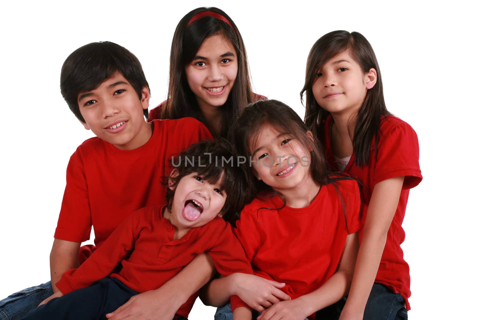 Five siblings with red shirts isolated on white