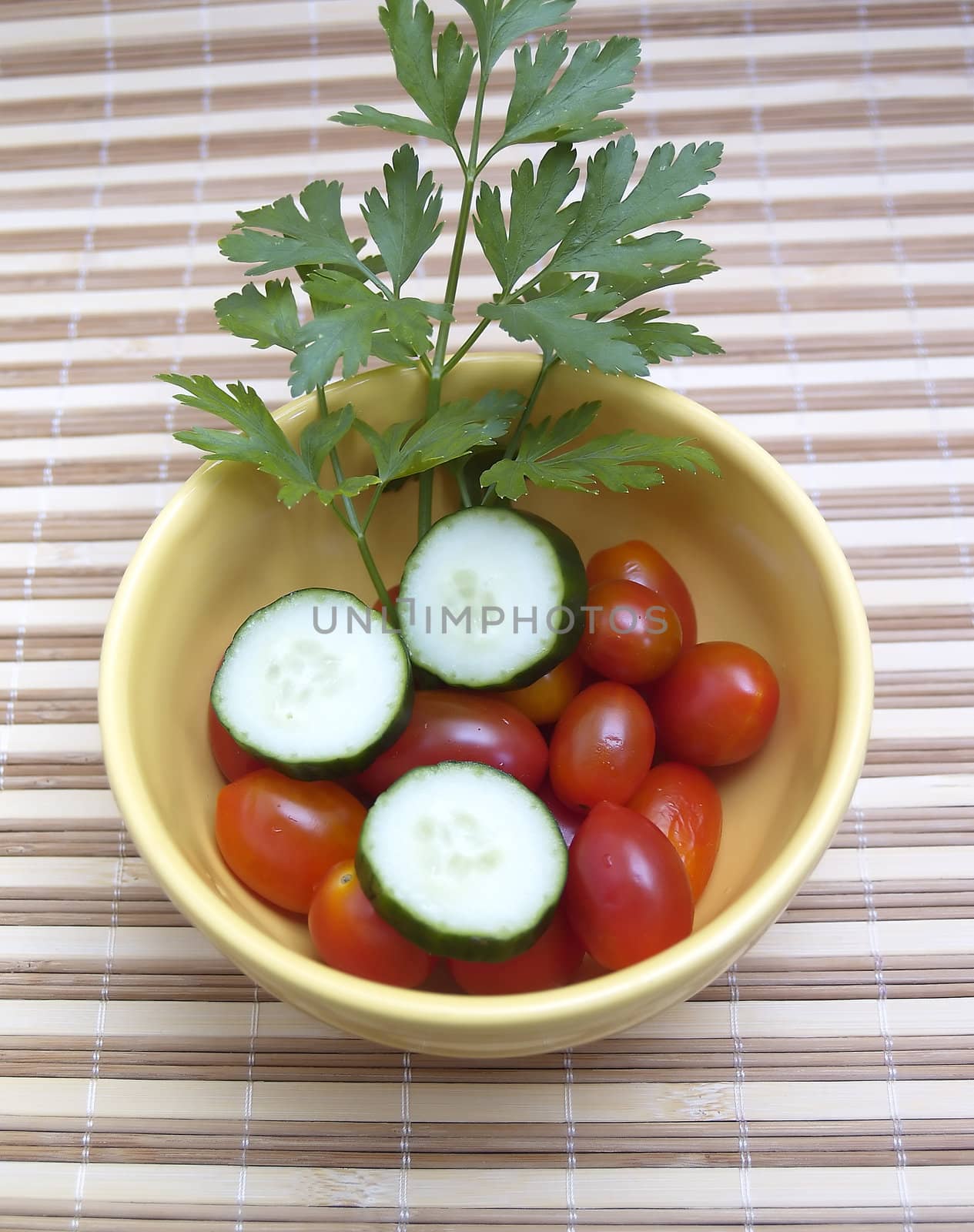 cherry tomatoes, parsley and cucumbers