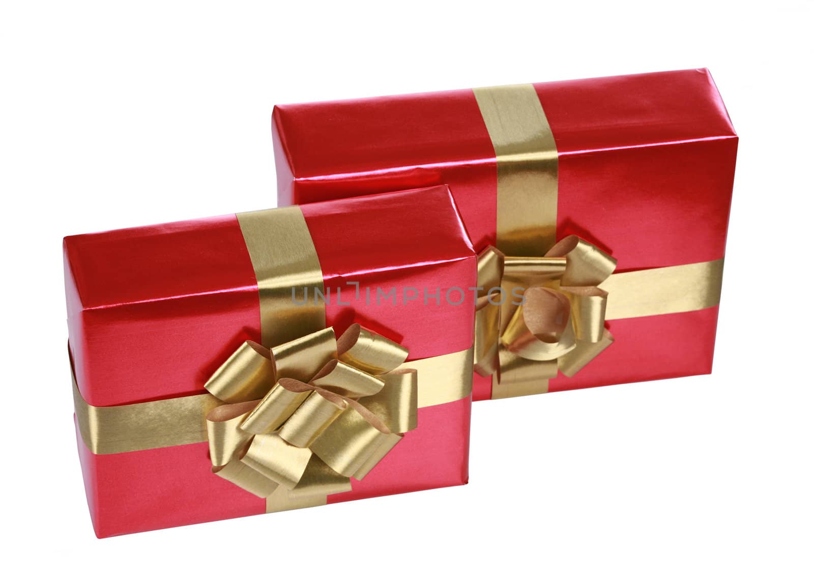 Elegant red presents with gold ribbons isolated on white