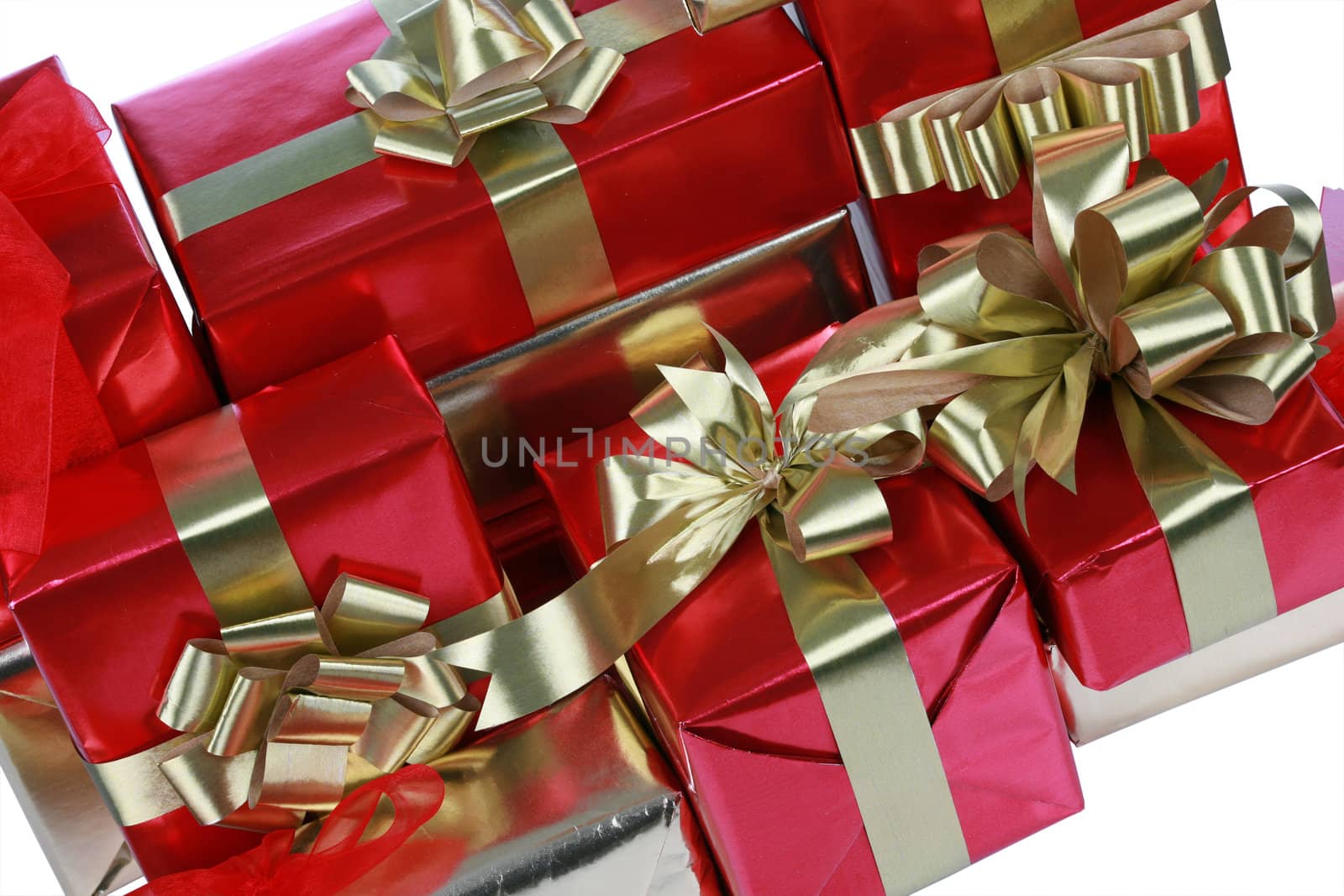 Elegant red presents with gold ribbons isolated on white