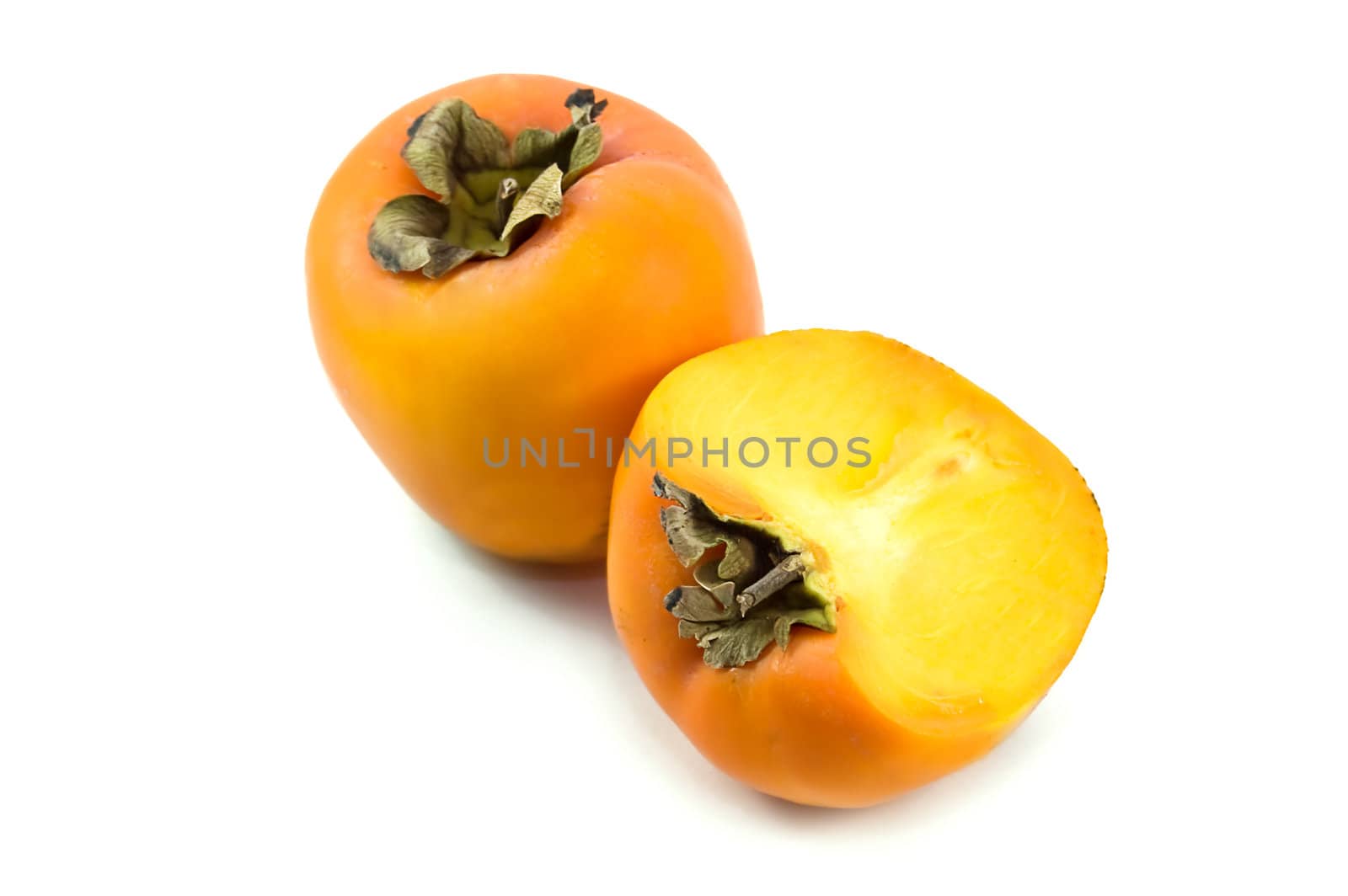 Ripen persimmon isolated on white