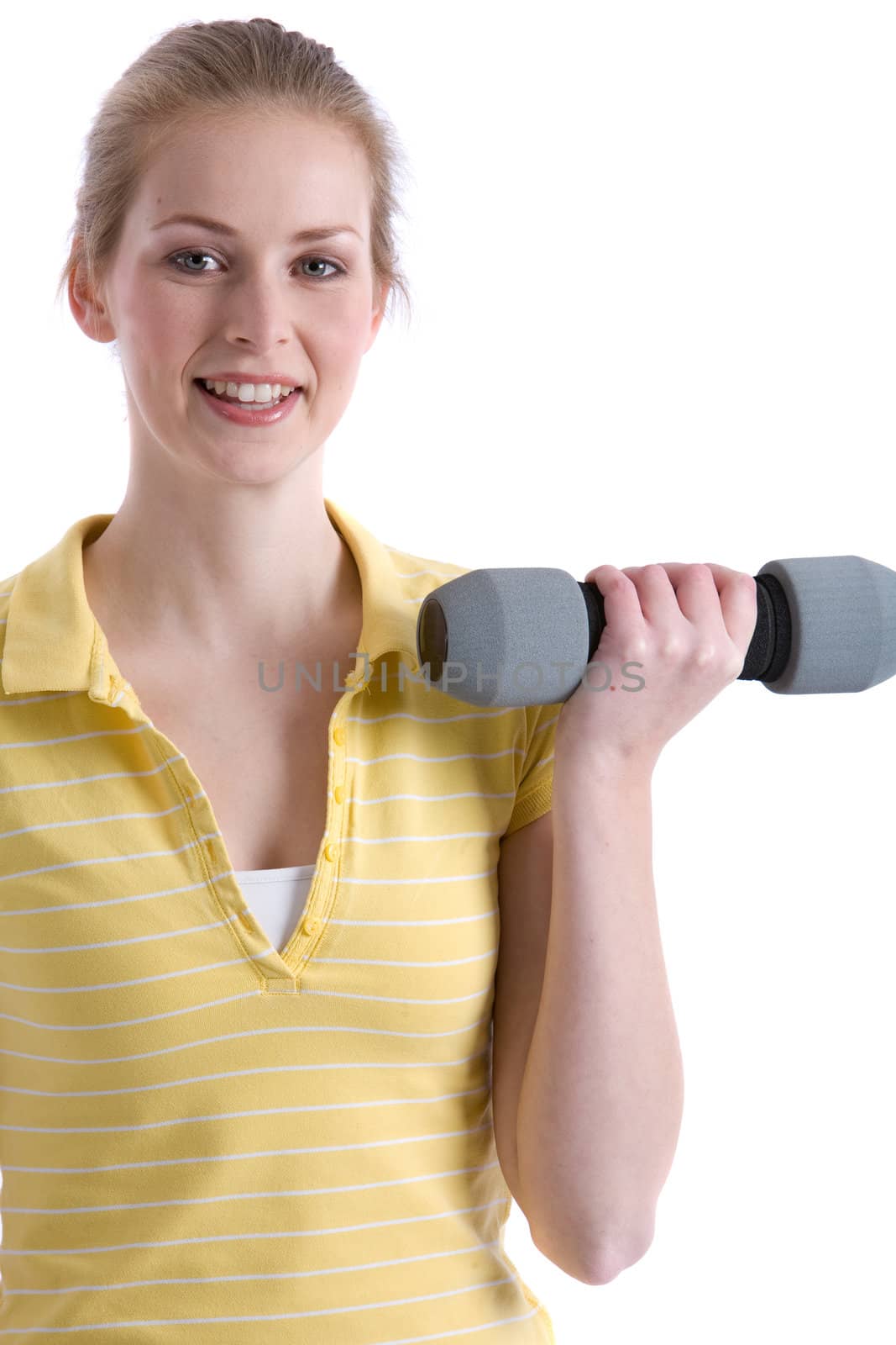 Pretty girl with dumbbells standing and training her biceps
