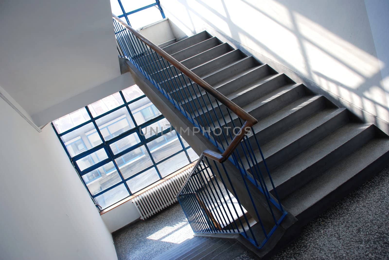 interior of public building with gray staircase