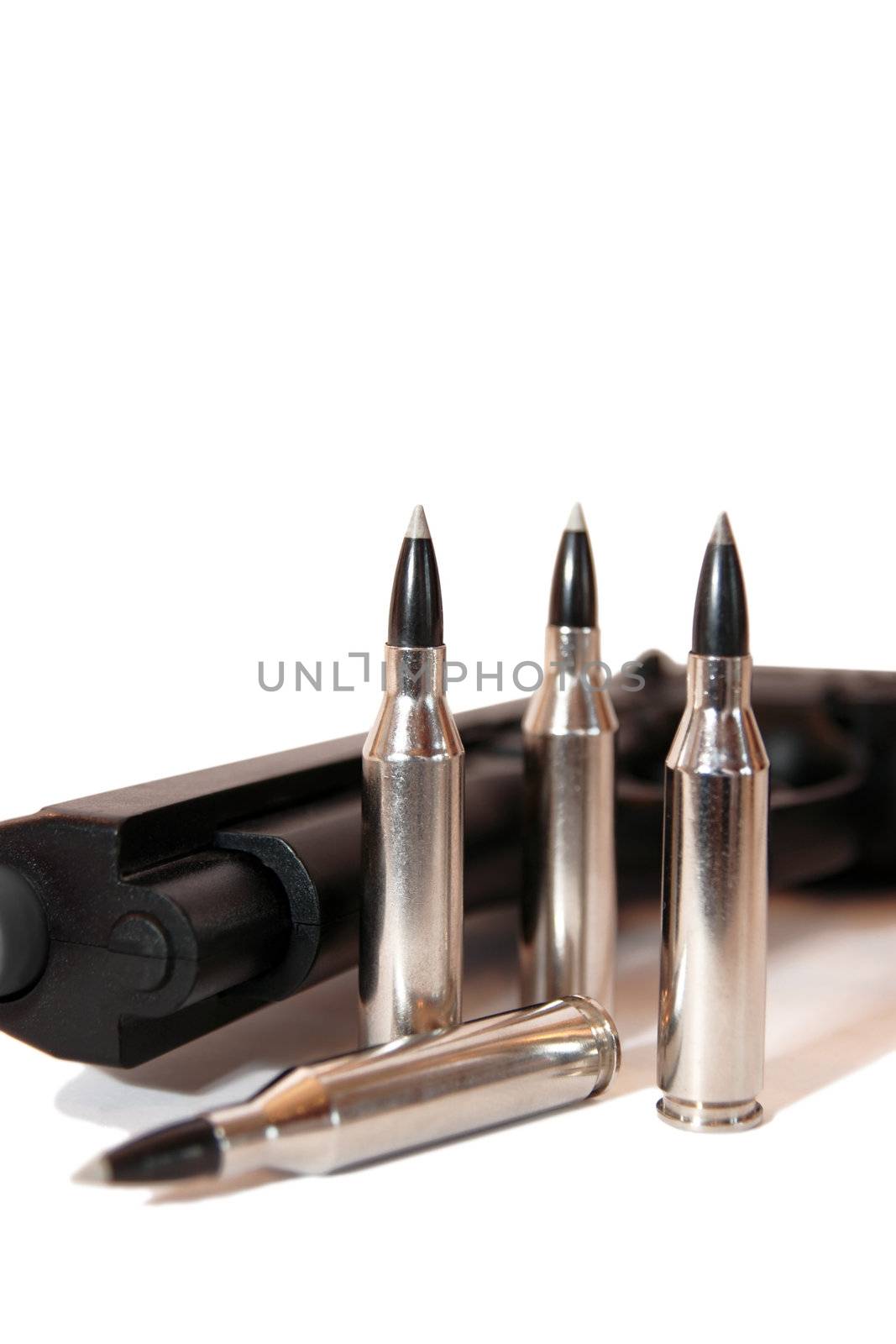 silver ammo and a handgun depicting gun culture
