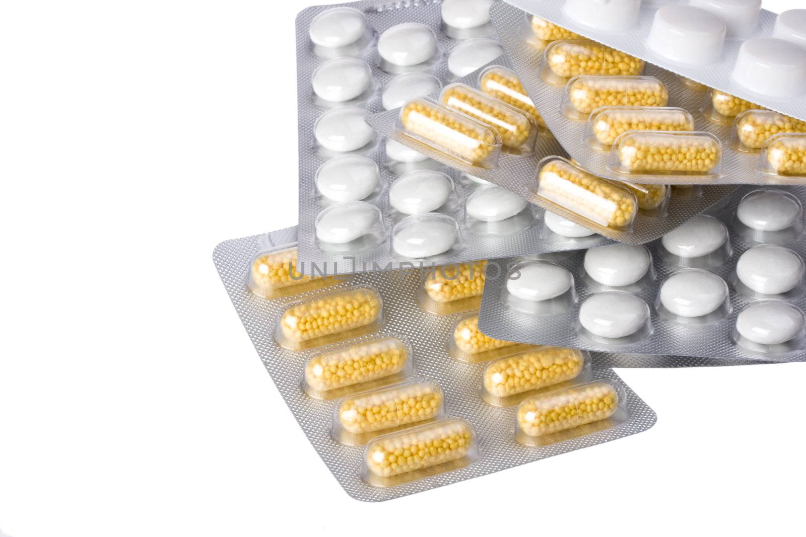 pills in blister package isolated on white by bernjuer