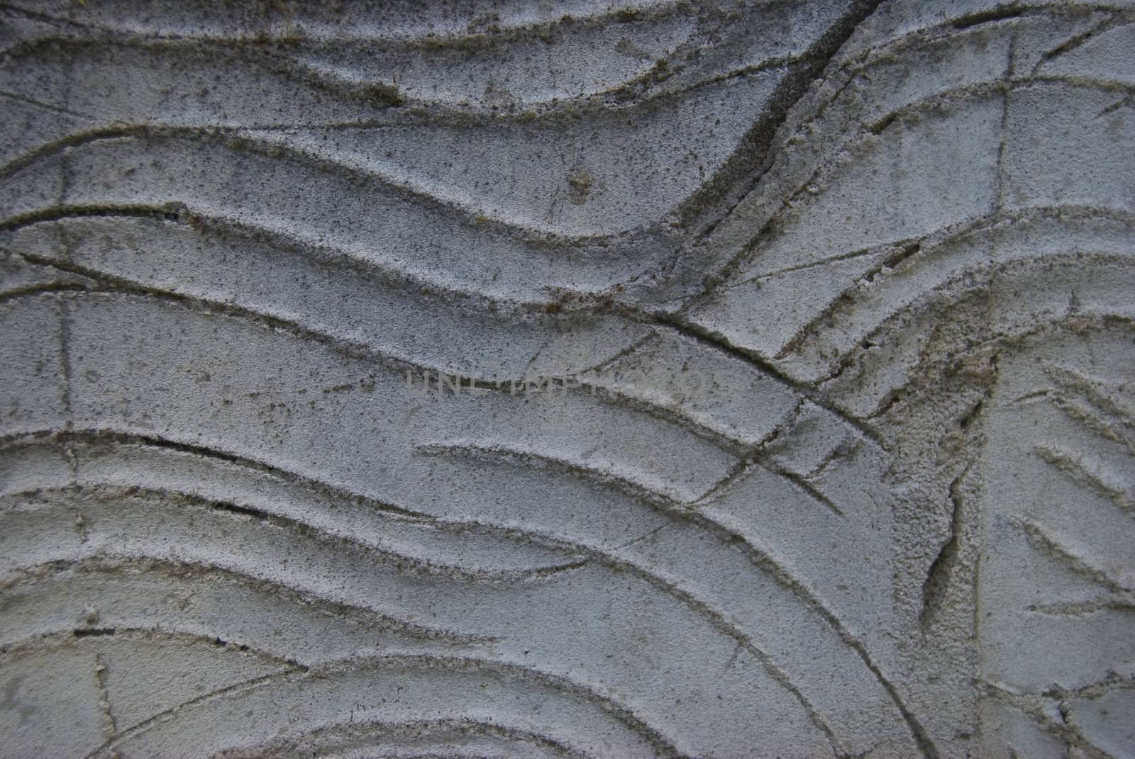 abstract details of a grey cement wall