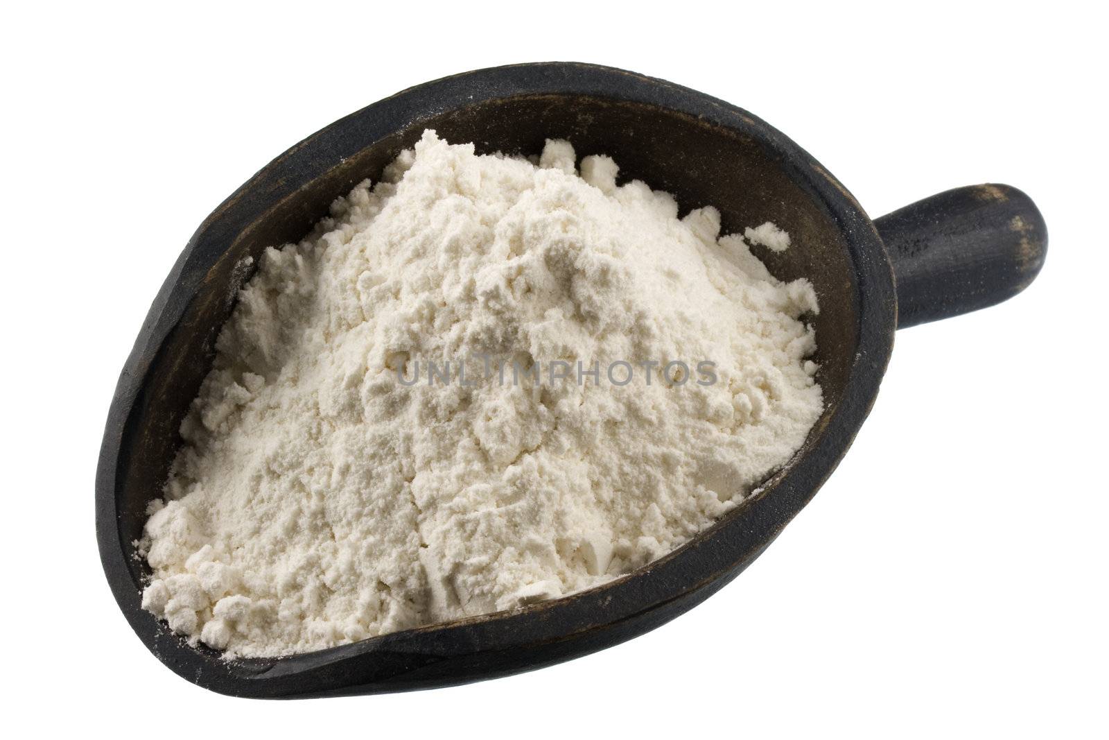 white wheat flour on a rustic, wooden scoop, isolated