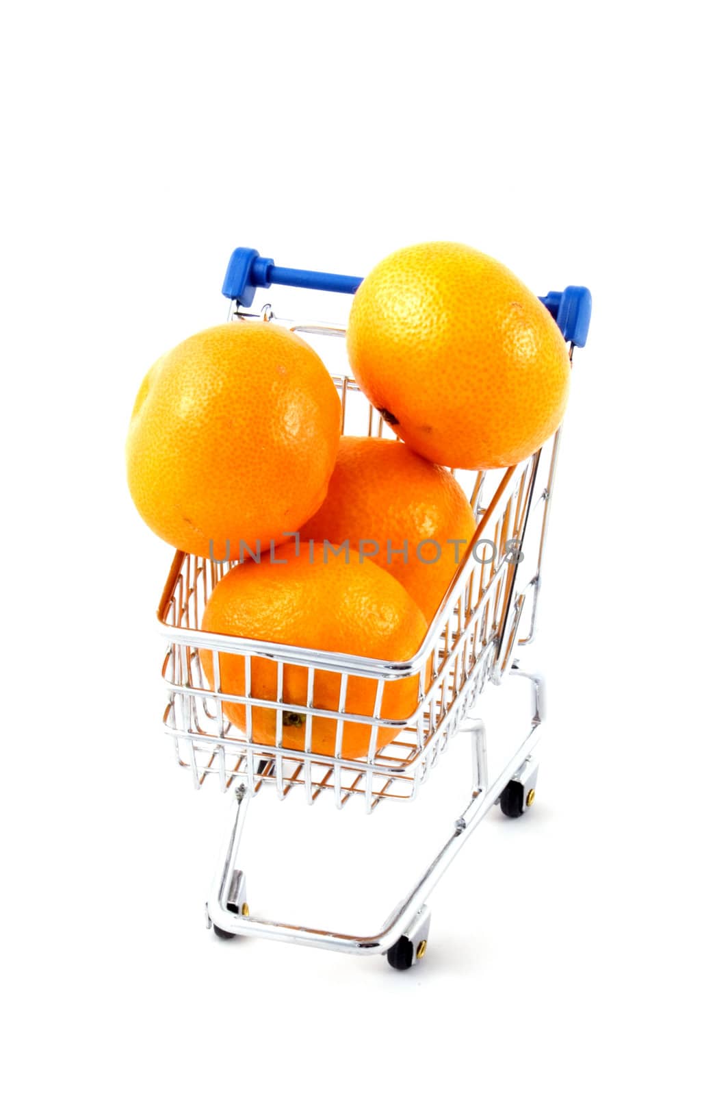 shopping cart filled with mandarines  isolated on white by ladyminnie