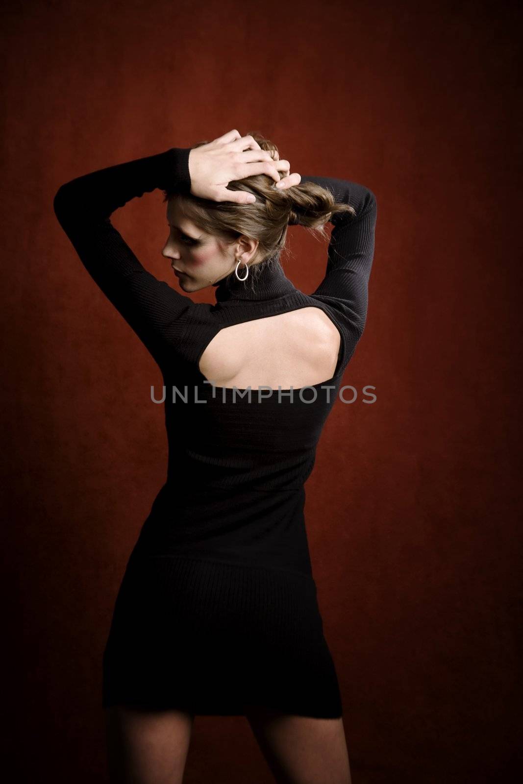 Pretty Woman in a Stretchy Knit Black Dress from Behind