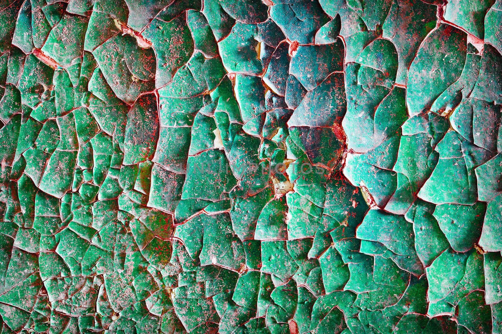 Dirty old cracked paint on the surface of the concrete wall