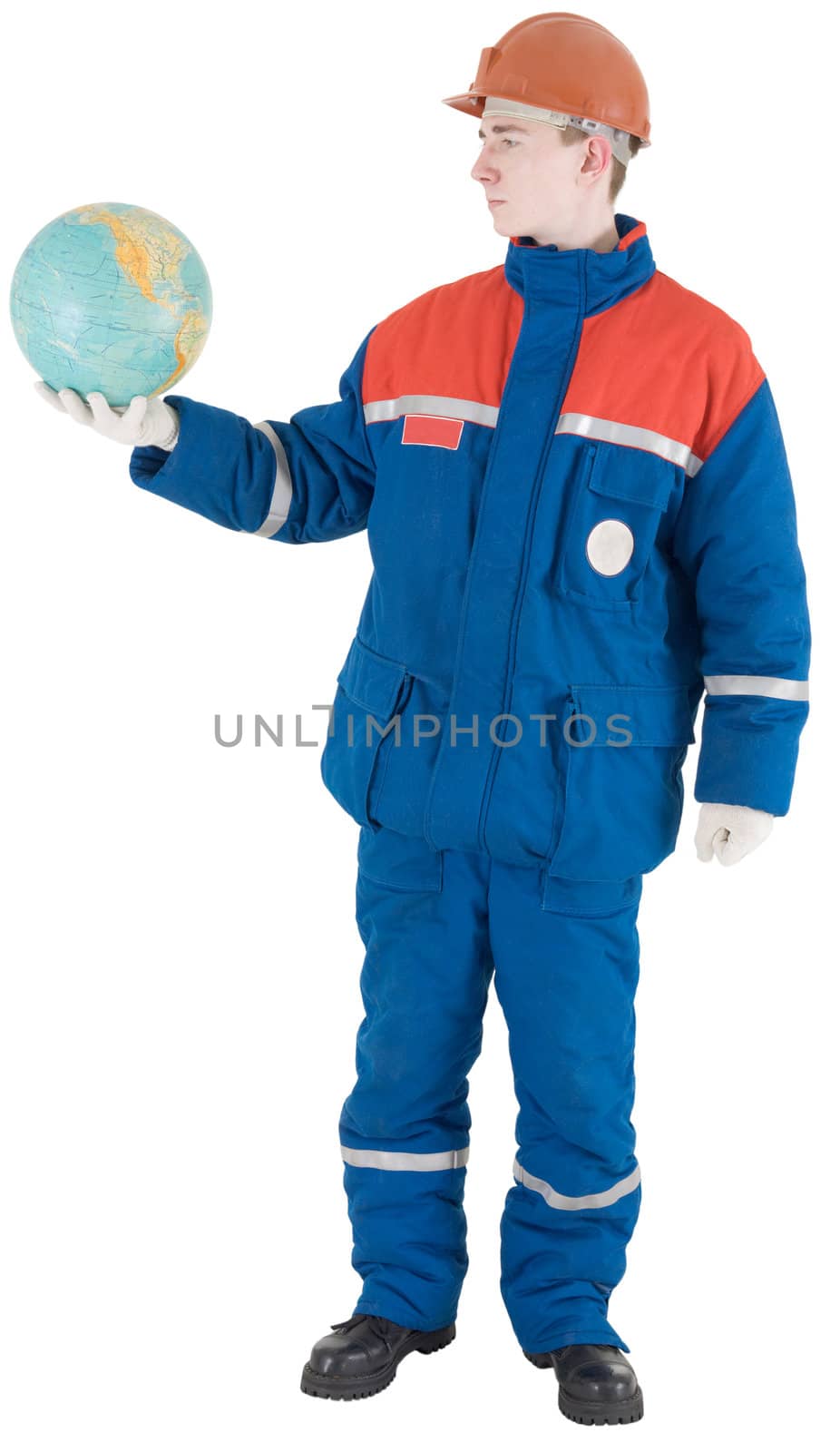 Man in overalls keep on the hand terrestrial globe