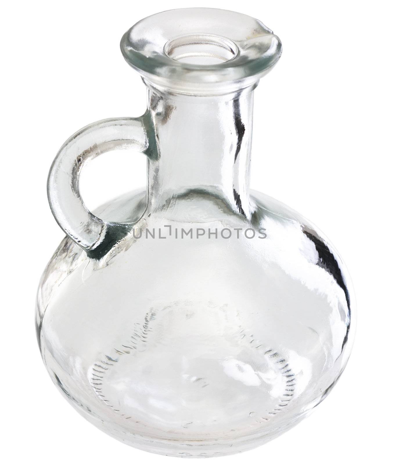 A transparent glass carafe on a white background