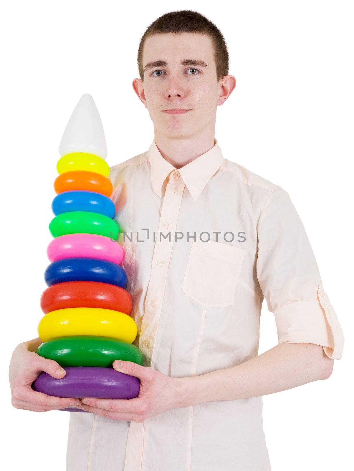 Young man holds in the hands toy pyramid