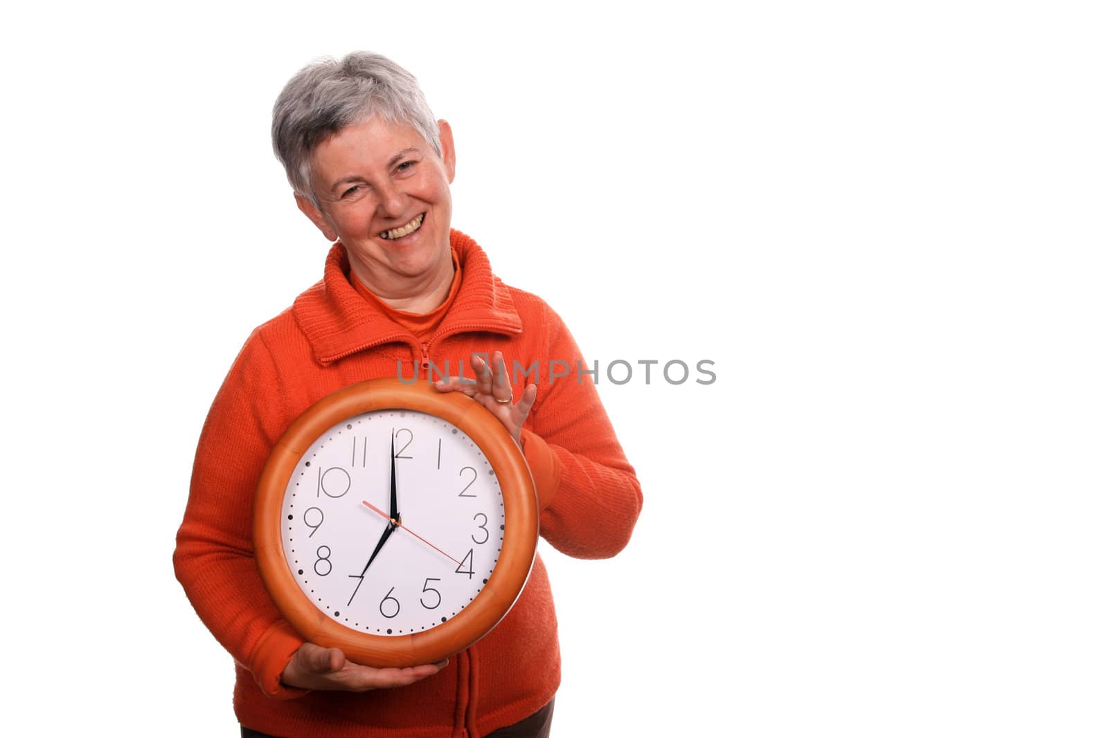 mature woman with clock over white background