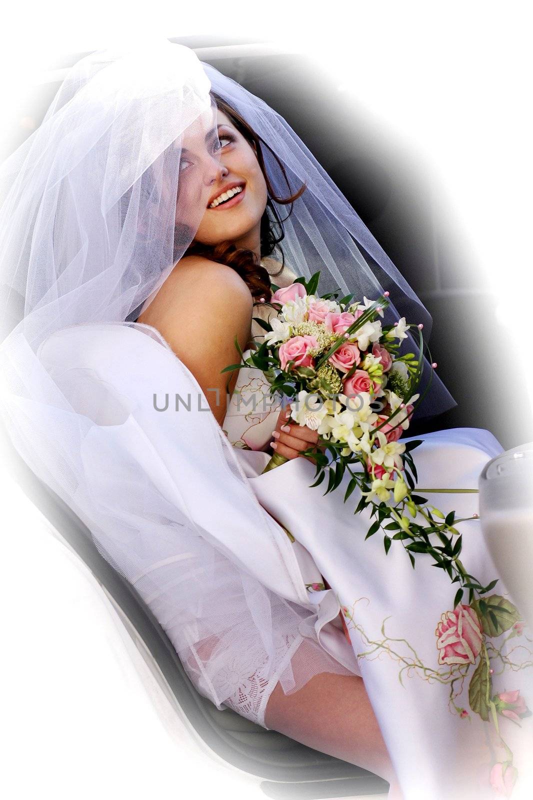 Smiling bride holding bouquet of flowers in wedding car limousine.