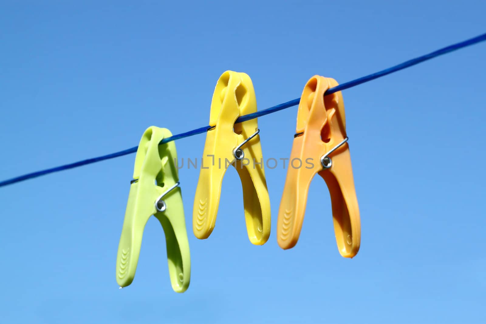 cloth pegs with a under the blue sky by artush