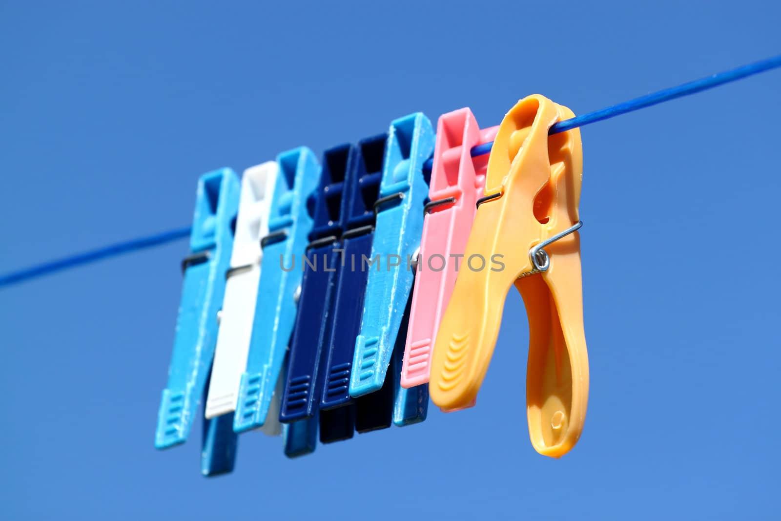cloth pegs with a under the clear blue sky
