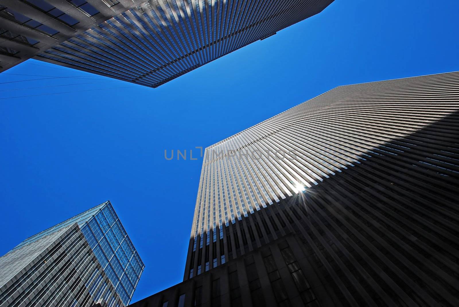 Modern office buildings in New York over blue sky