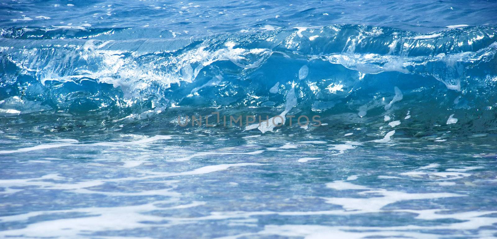 blue wave formation with foam in adriatic sea