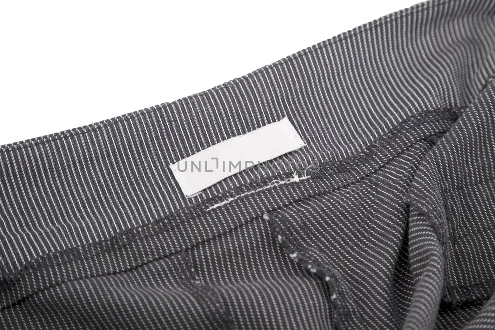 close-up of striped fabric and blank tag