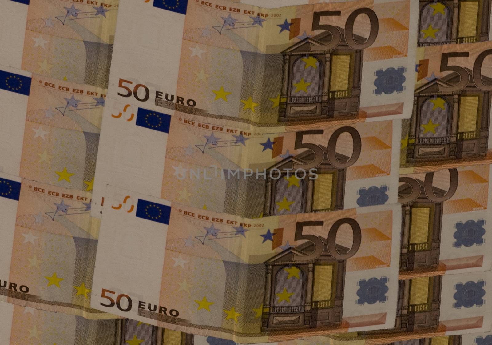 banknotes of fifty euros on white background