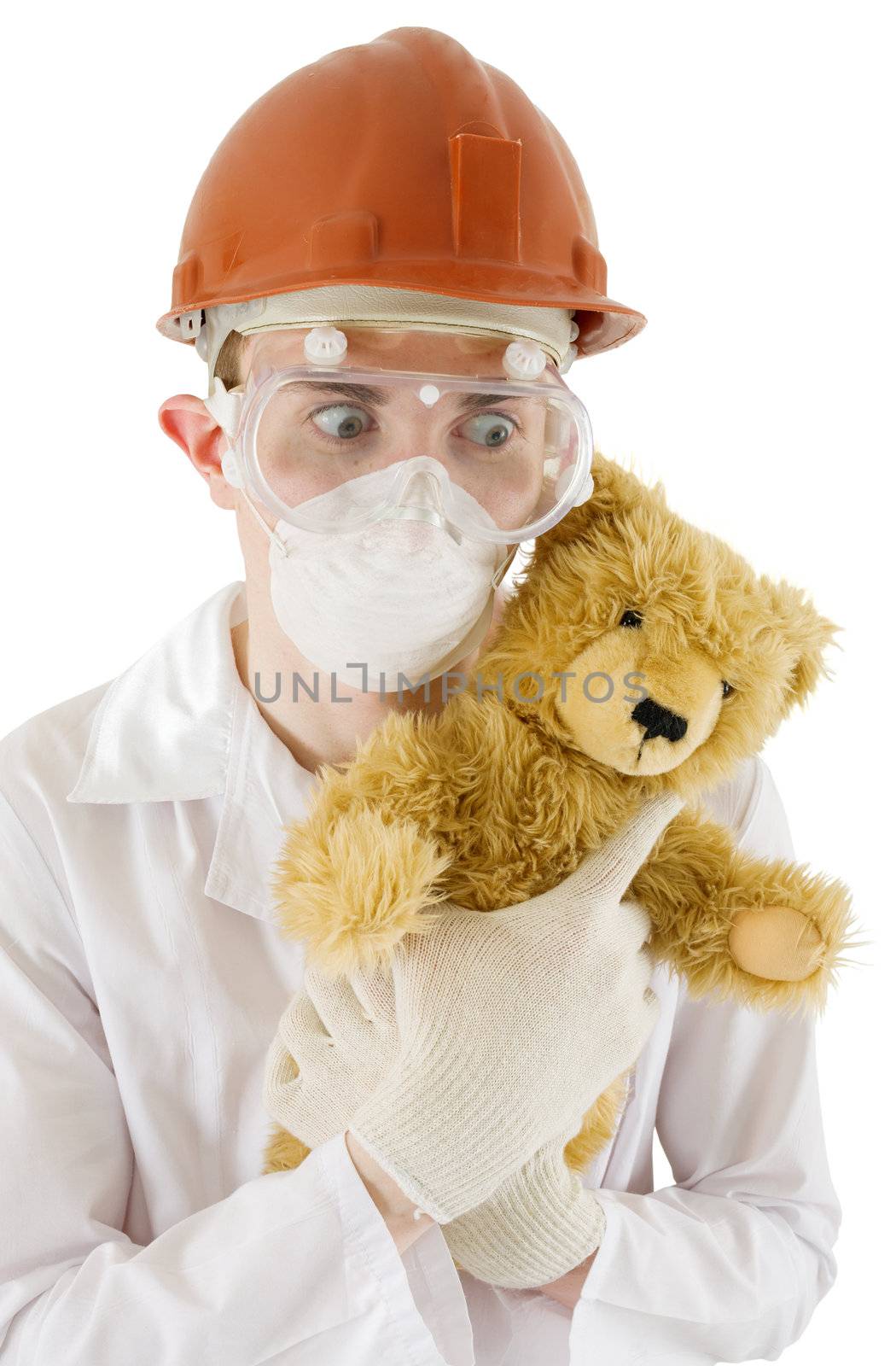 Scientist holding toy bear in hands on the white background