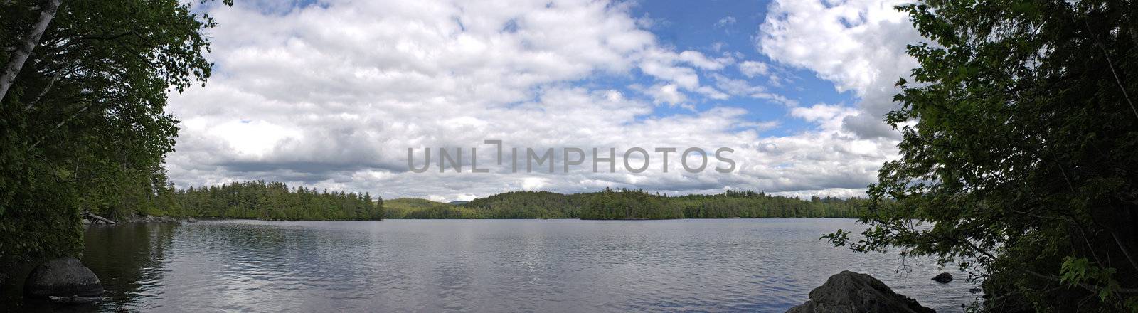 A wide angle panoramic view of the lower Saranac Lake and islands located in the upstate New York Adirondacks.