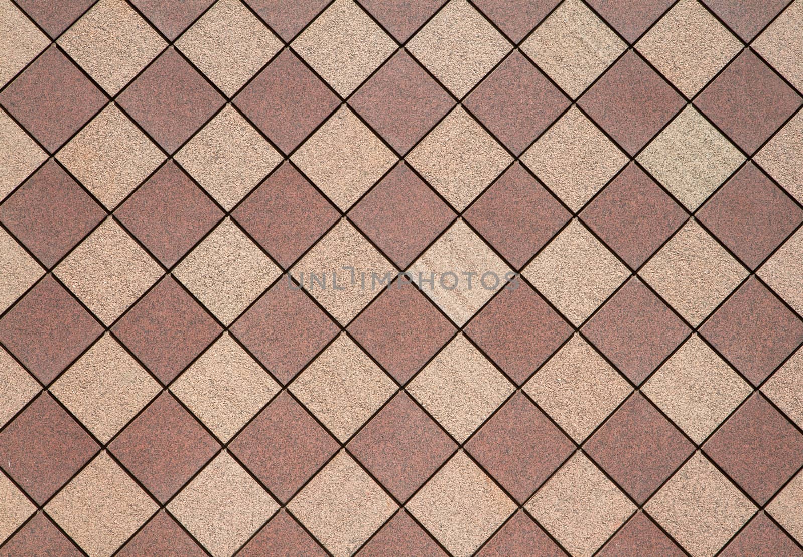 Brown and tan checkered wall in a horizontal image