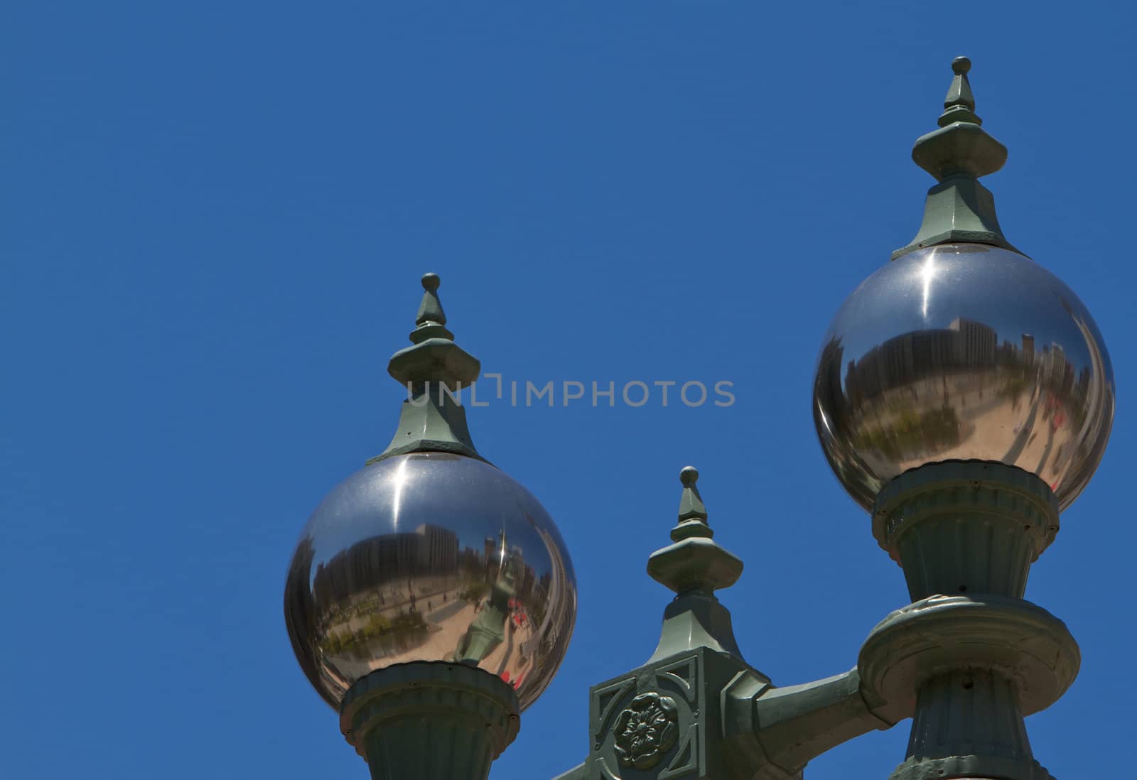 Unusual two mirror sphere or globe light post