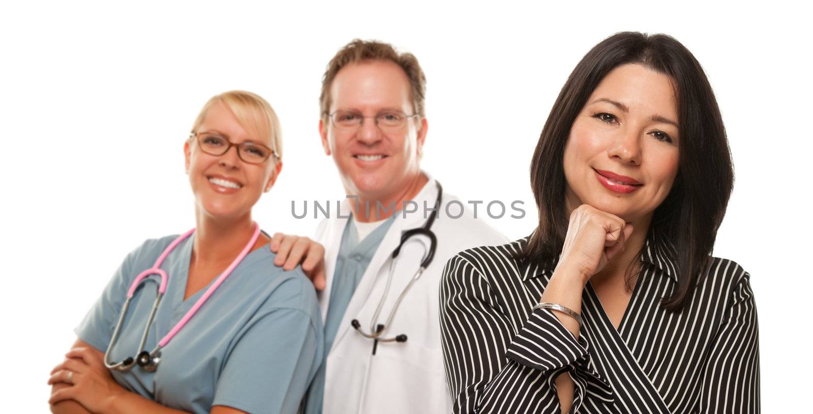 Hispanic Woman with Male Doctor and Nurse Isolated on a White Background.