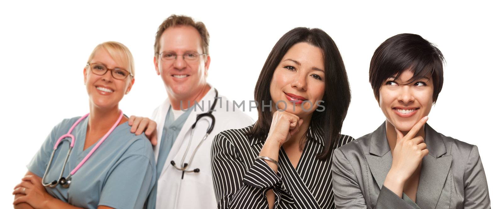 Attractive Hispanic Mother and Daughter with Doctor and Nurse Isolated on a White Background.