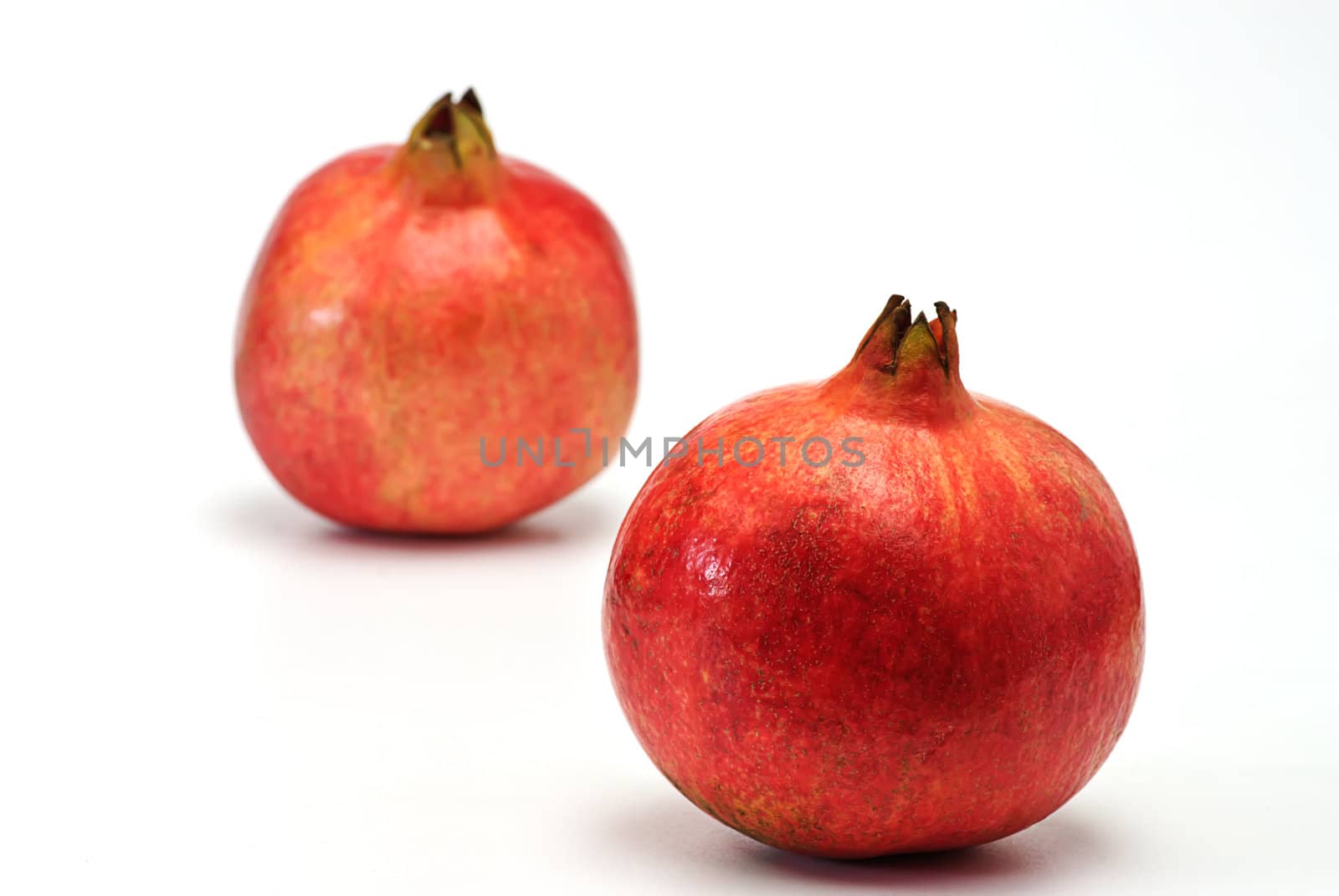 fresh pomegranate isolated on white