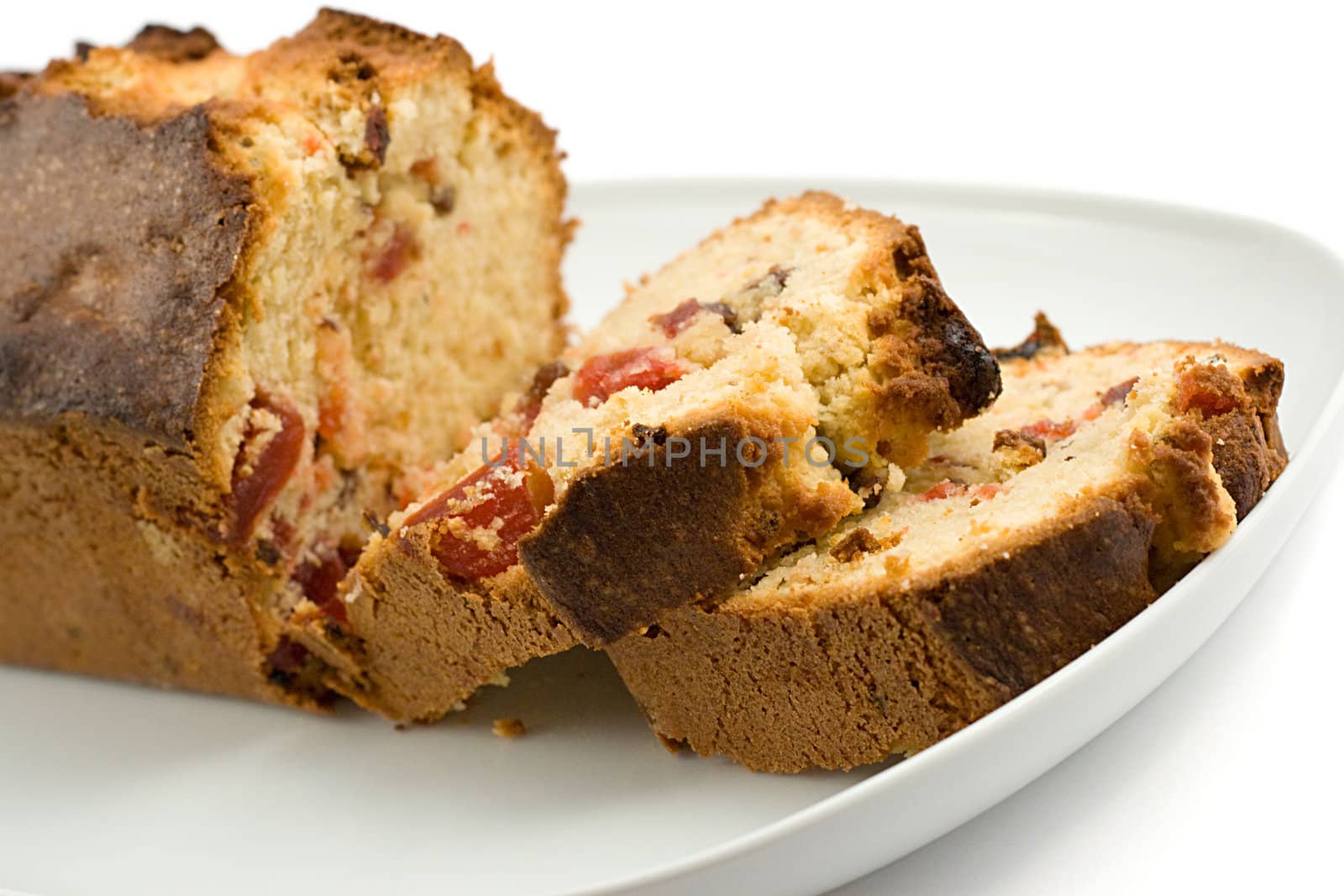 fruit cake, shallow DOF, shot on white