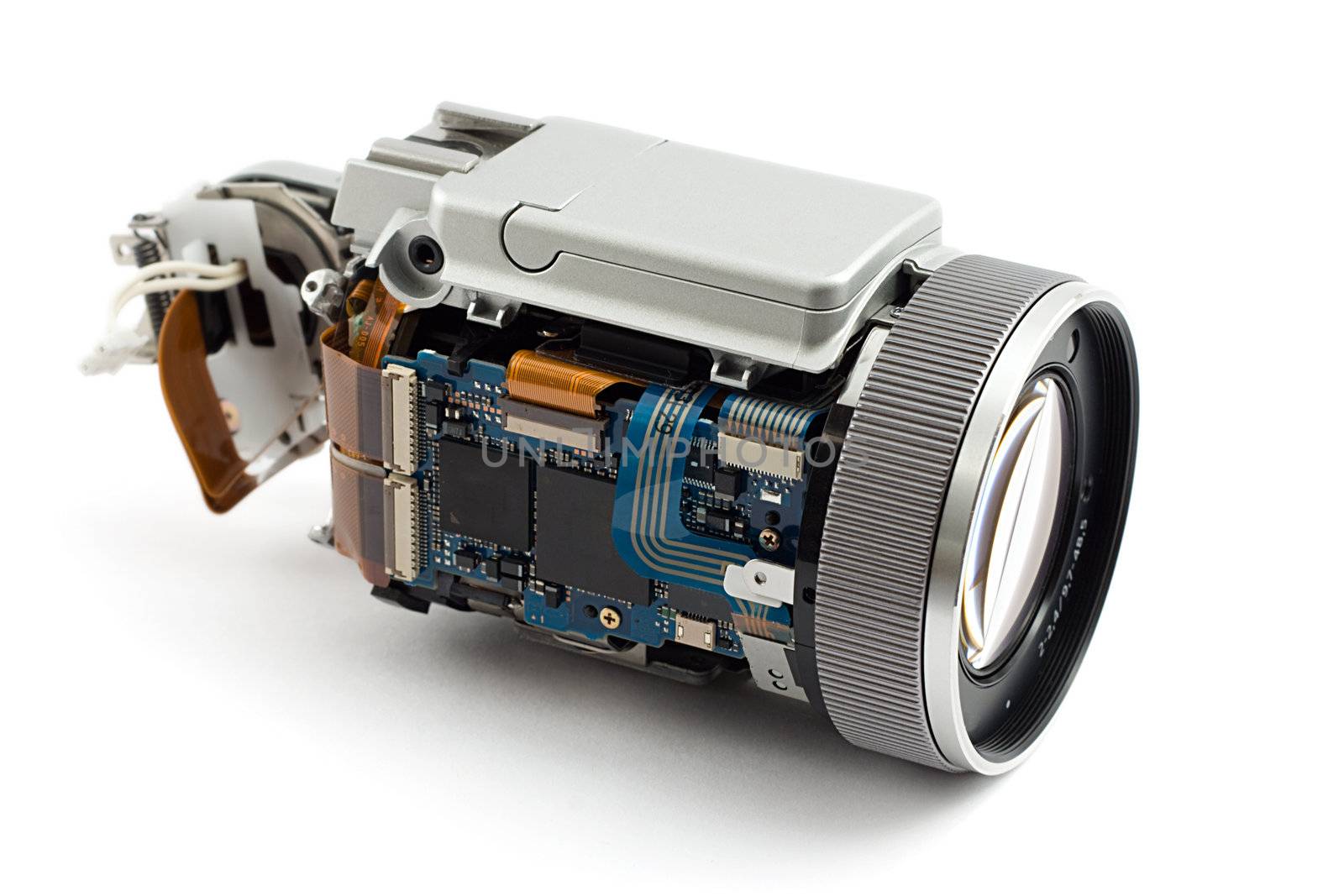 disassembled photo camera, shot on whitre