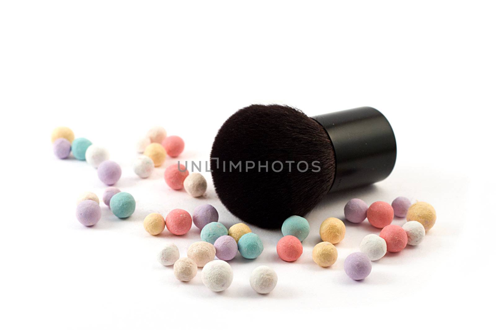 makeup powder with brush, shallow DOF, shot on white