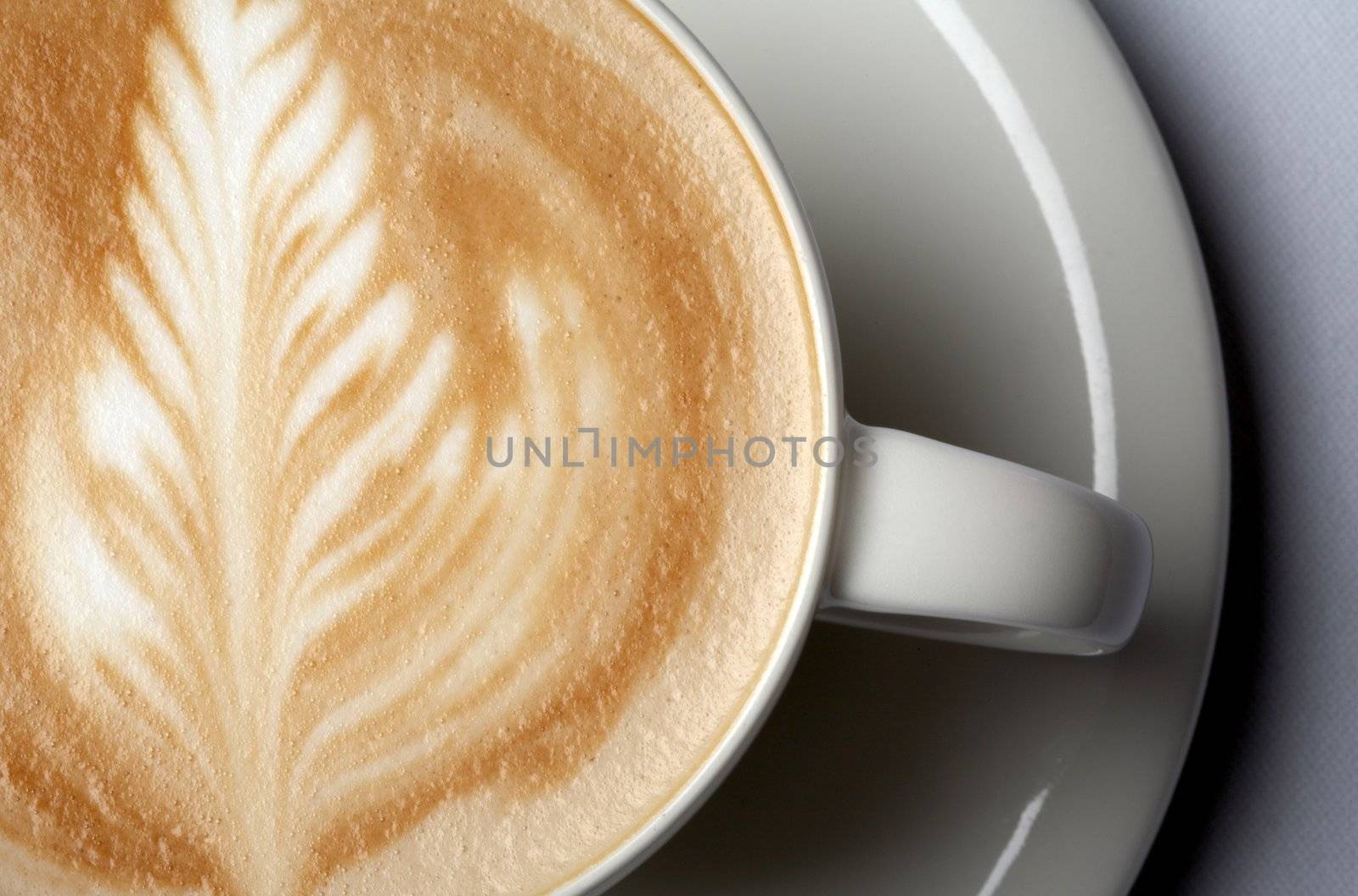 close-up shot of barista coffee cup