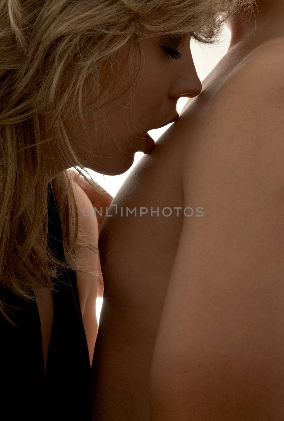 backlight silhouette intimate image of couple