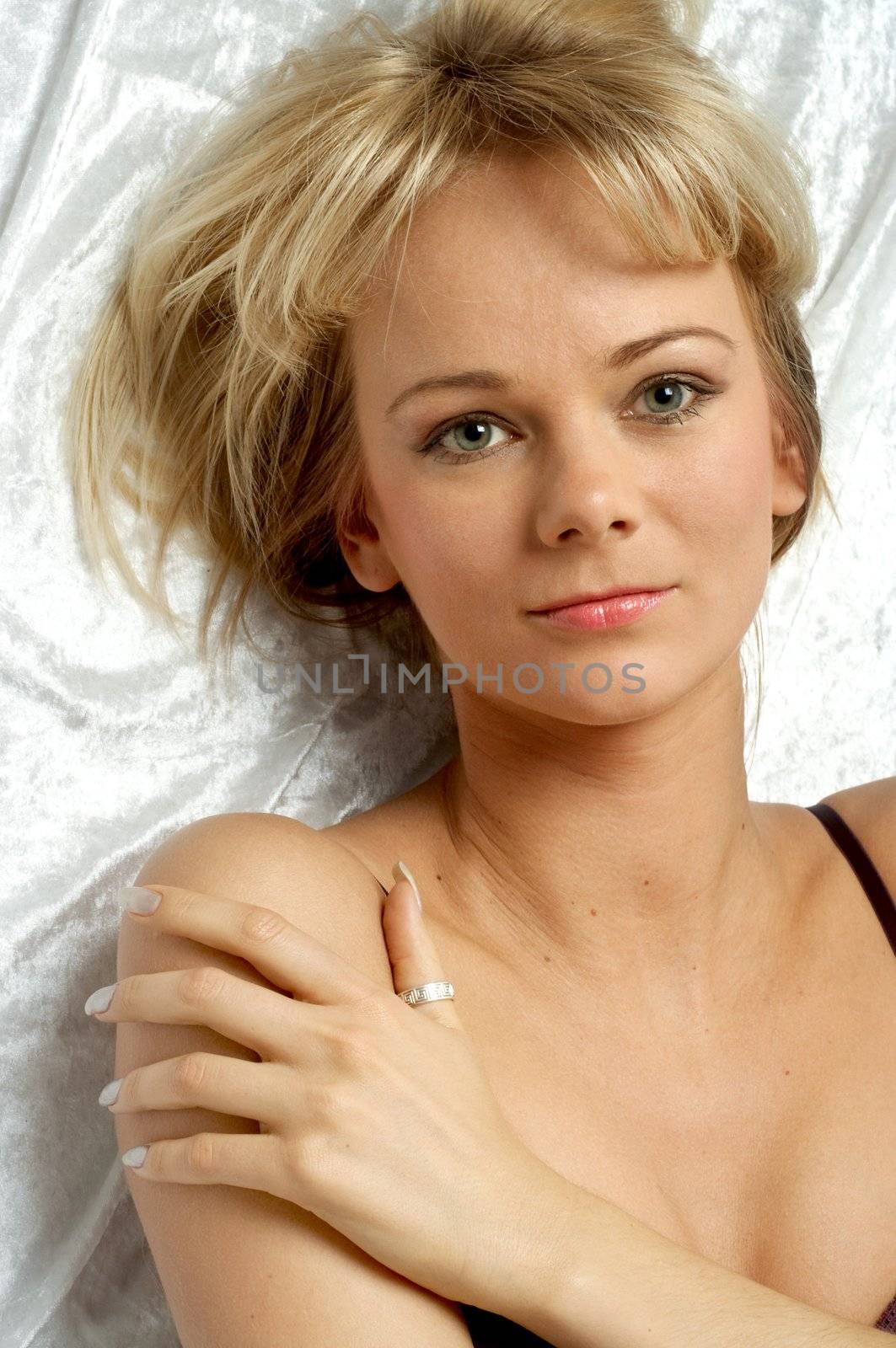 lovely blond laying in bed