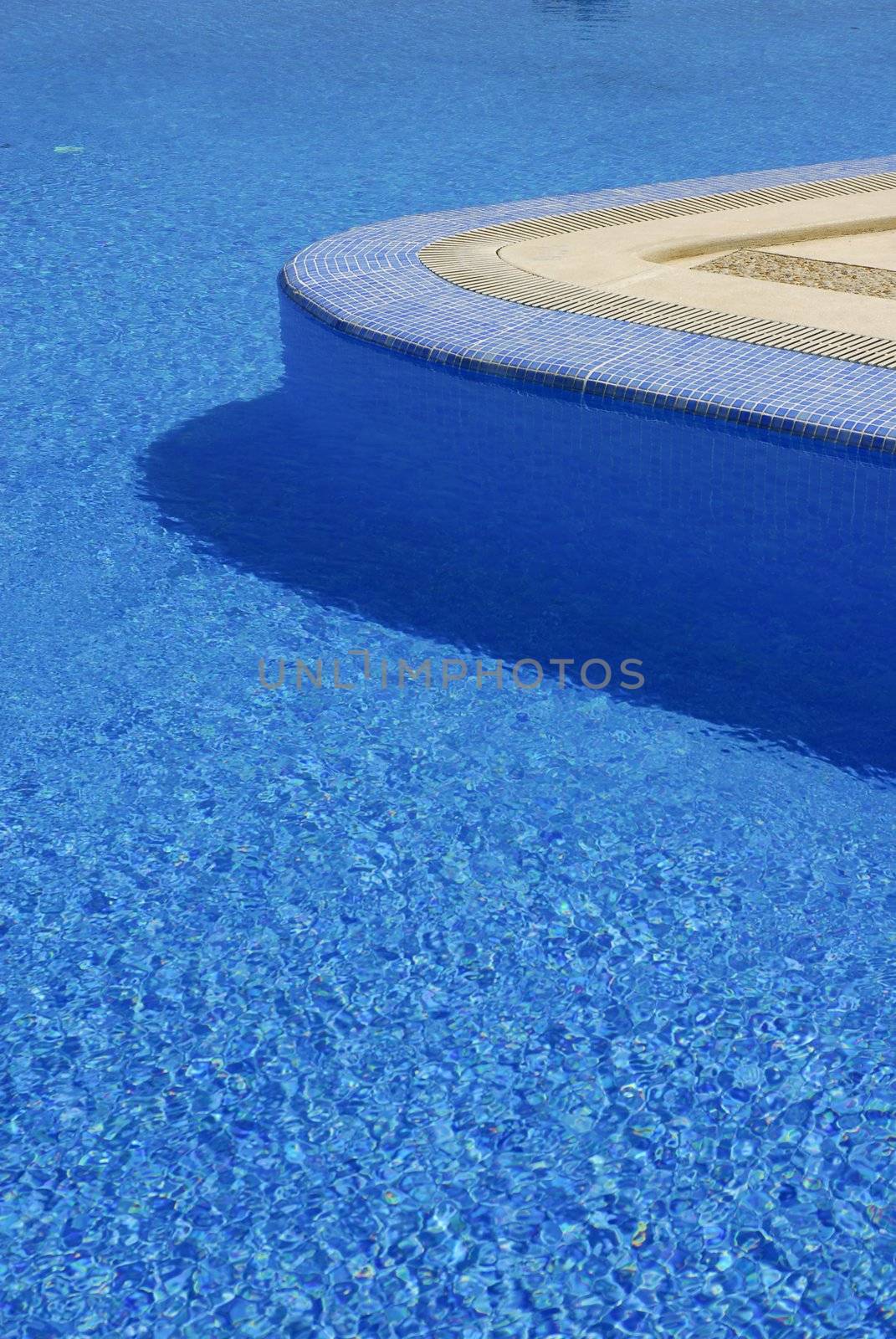 swimming pool blue water in a summer day